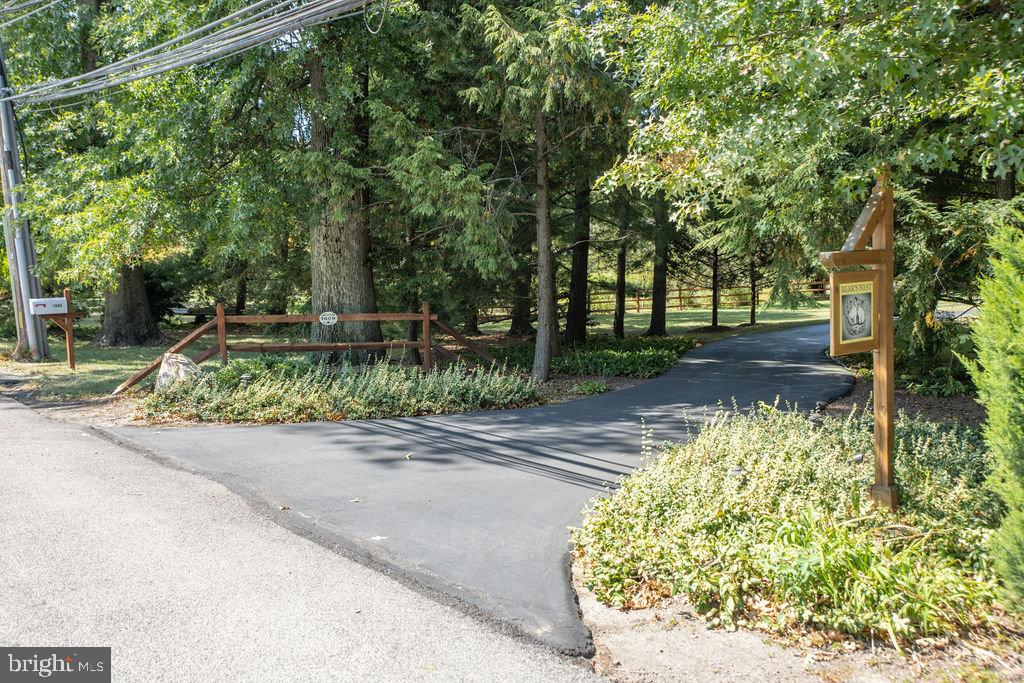 1609 Walton Road Blue Bell, PA 19422 - Photo 2 of 64 a view of a pathway with a yard