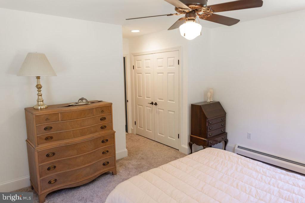 1609 Walton Road Blue Bell, PA 19422 - Photo 34 of 64 a bedroom with a bed and a dresser