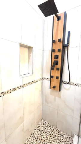 a view of balcony with wooden floor