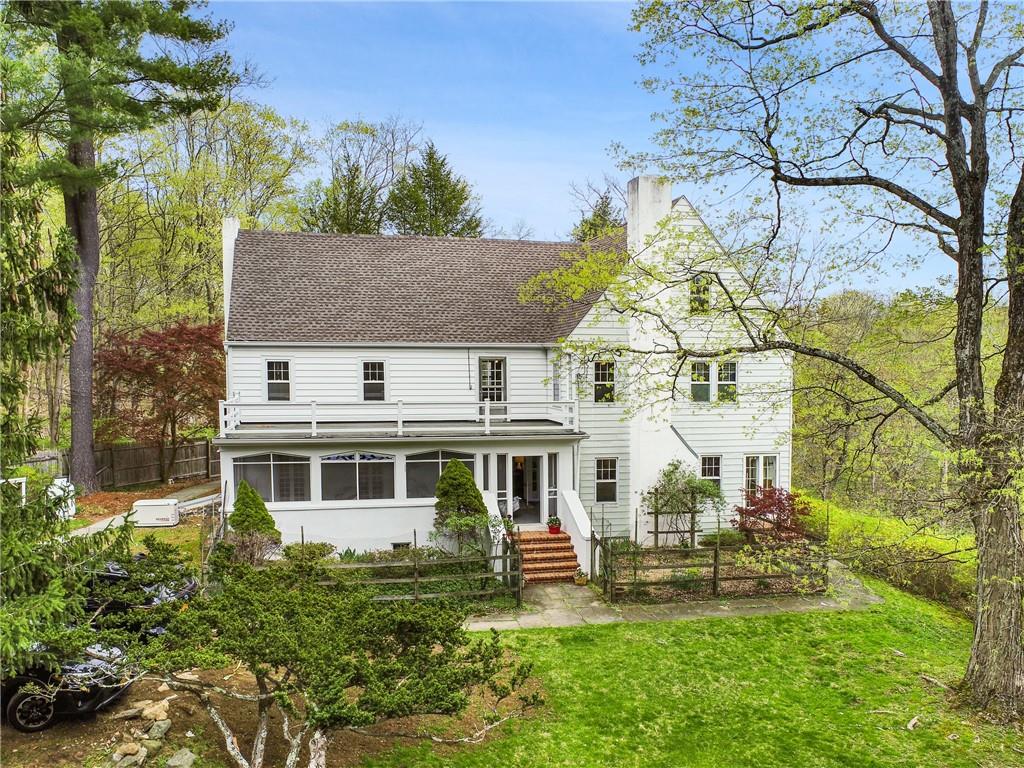 Welcome home to your artist's oasis bordering Teatown Lake Nature Preserve!