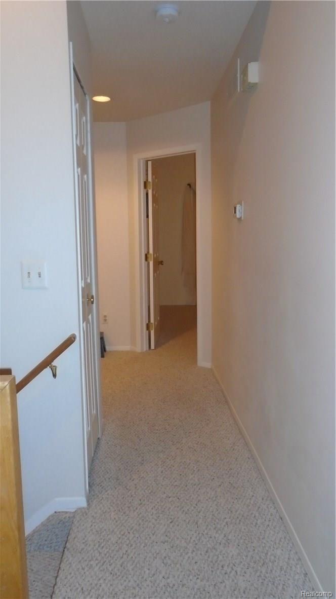 39870 Crosswinds Road Novi, MI 48375 - Photo 39 of 46 Hallway view from living room to bedrooms