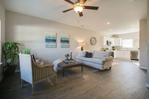 a living room with furniture and a window
