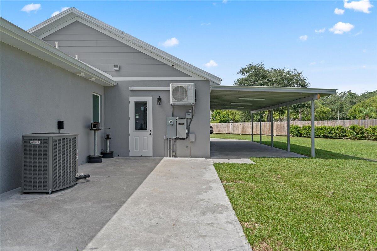 3490 Grant Line Road Mims, FL 32754 - Photo 26 of 43 a view of a back yard of the house
