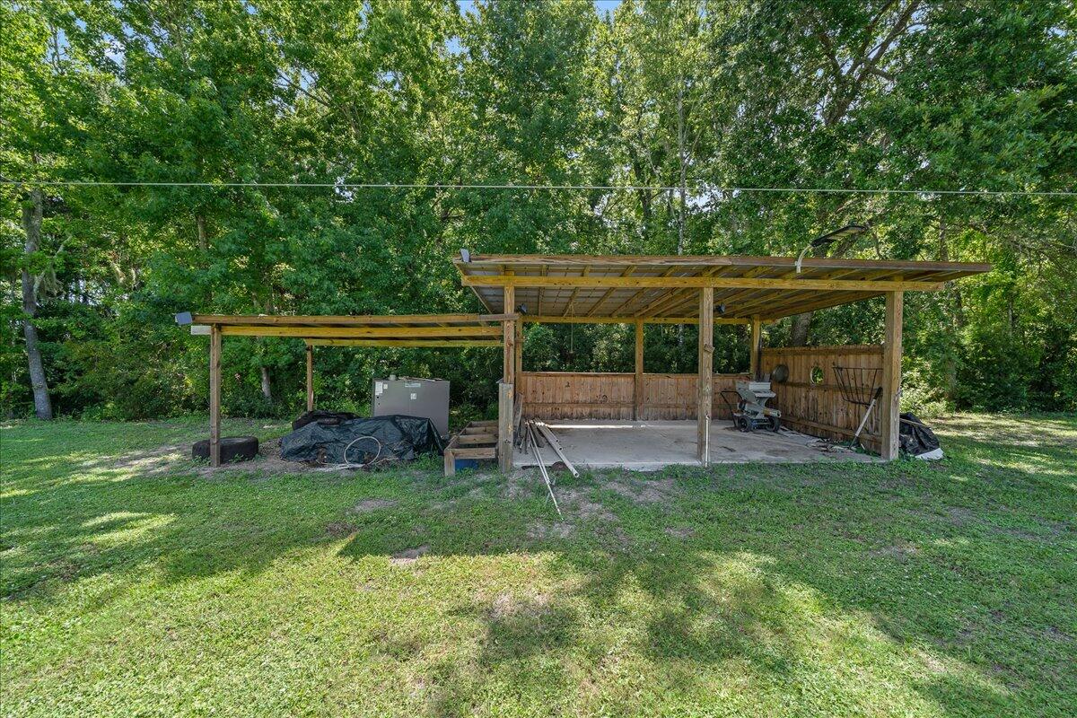 3490 Grant Line Road Mims, FL 32754 - Photo 32 of 43 a view of backyard with seating and green space