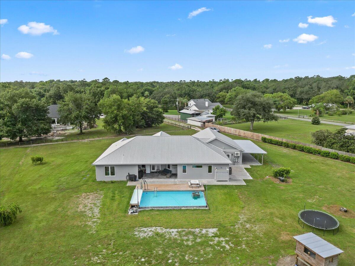 3490 Grant Line Road Mims, FL 32754 - Photo 35 of 43 an aerial view of a house with a garden