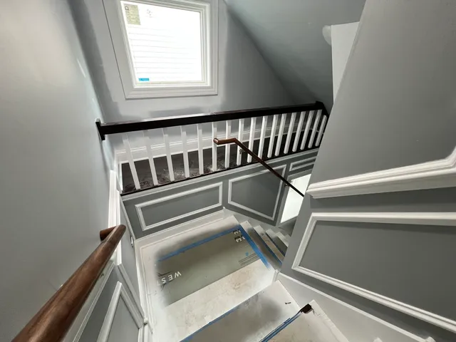 a view of a balcony with furniture