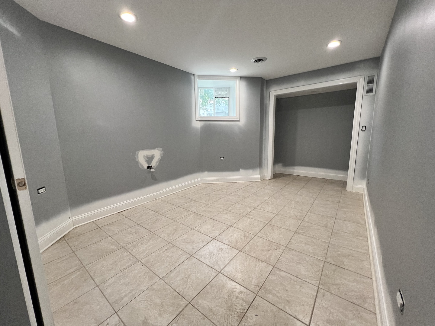 600 North Pine Avenue Chicago, IL 60644 - Photo 12 of 21 an empty room with windows