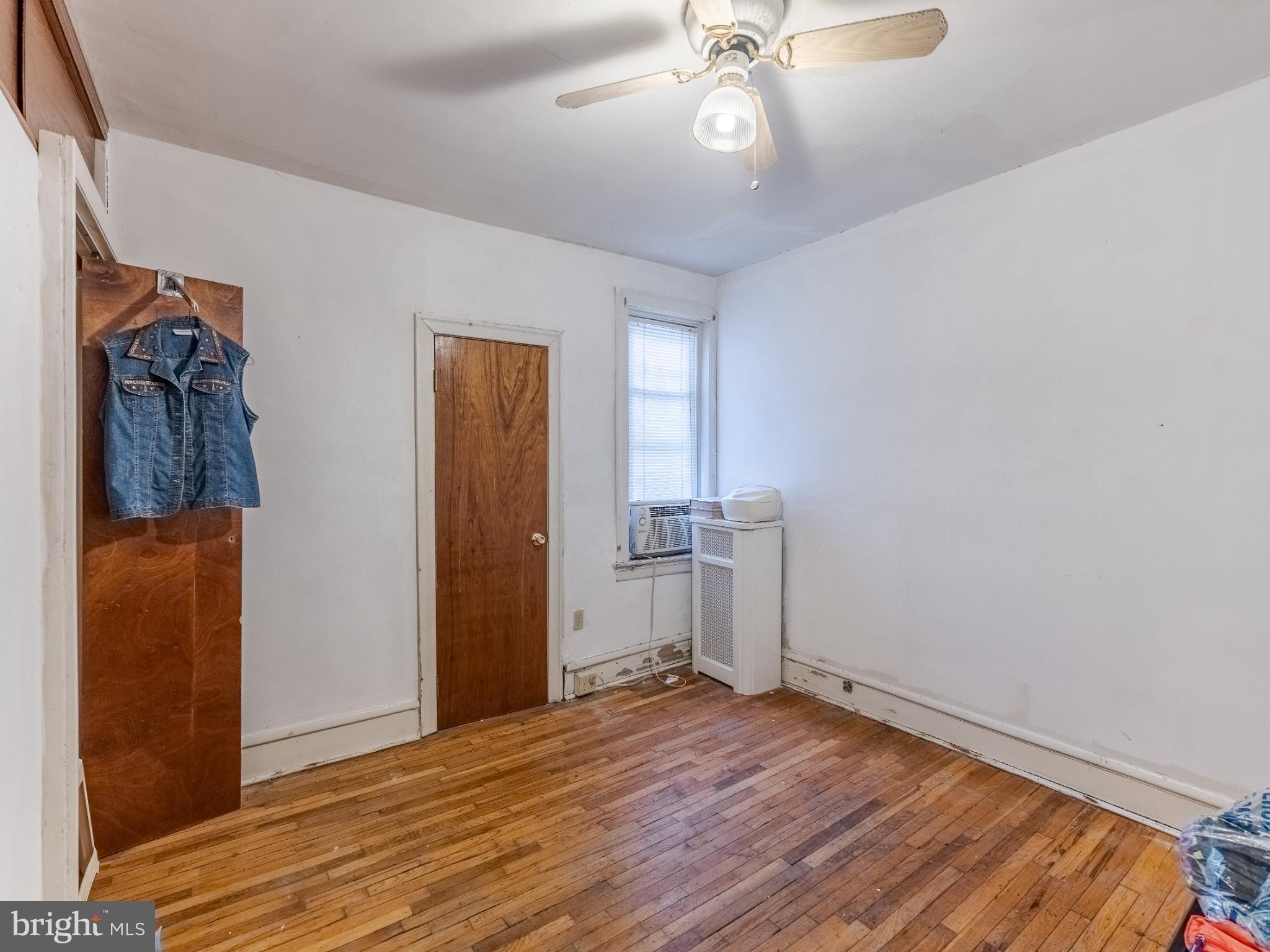 5329 Willows Avenue Philadelphia, PA 19143 - Photo 23 of 32 Bright and airy room with wooden floors.