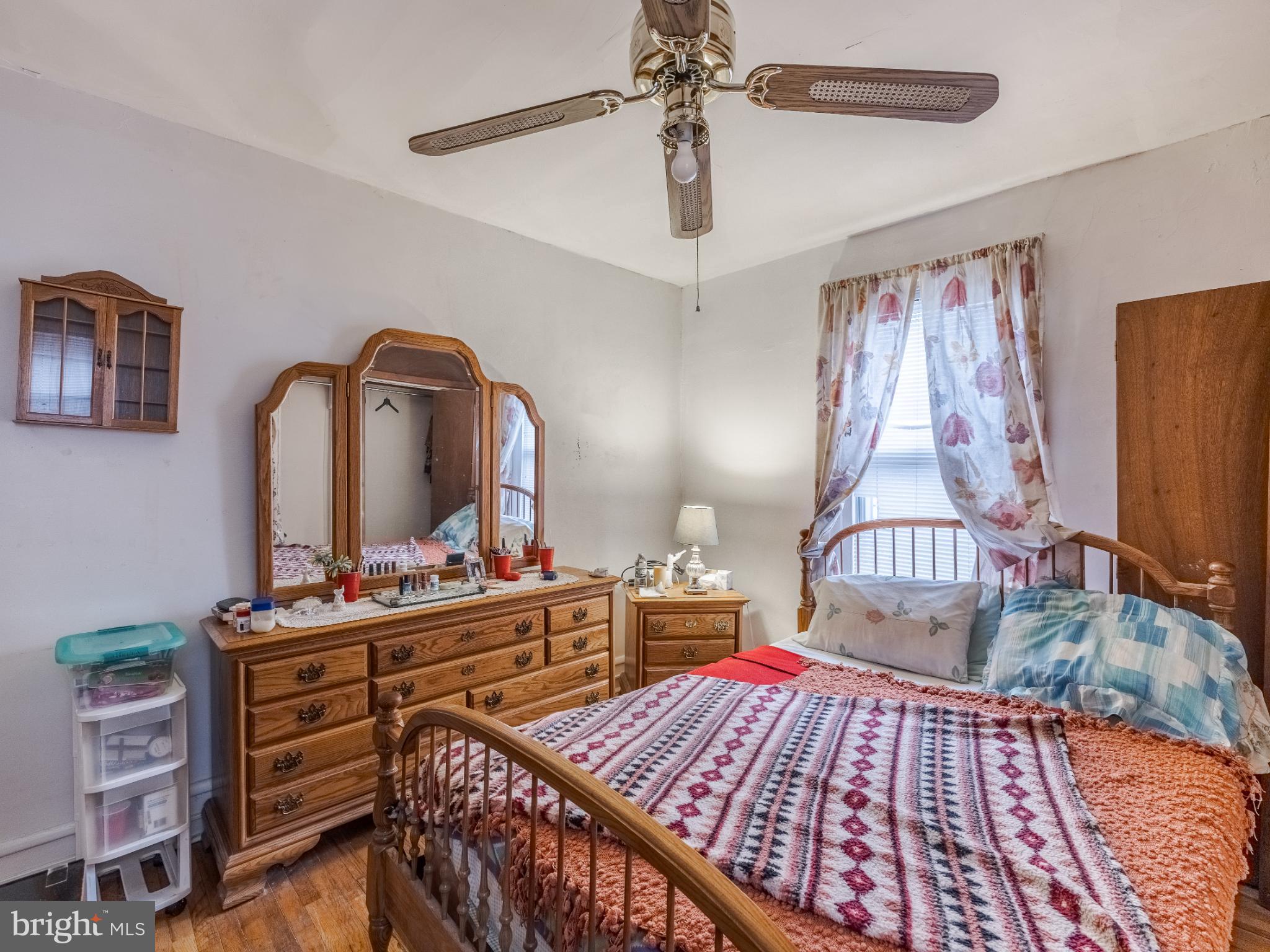 5329 Willows Avenue Philadelphia, PA 19143 - Photo 27 of 32 Cozy bedroom with warm, inviting decor.