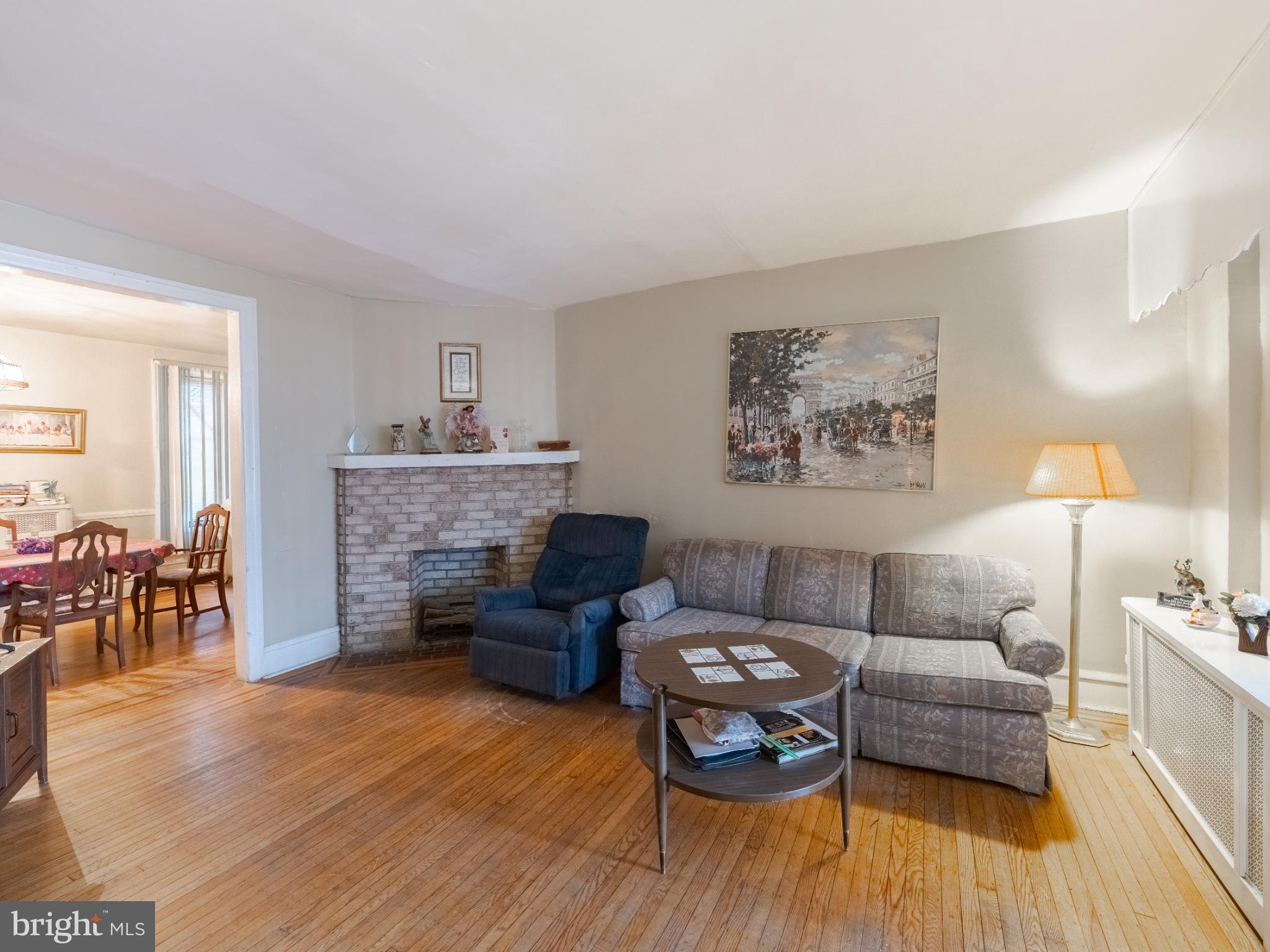 5329 Willows Avenue Philadelphia, PA 19143 - Photo 7 of 32 Cozy living space with warm, inviting charm.