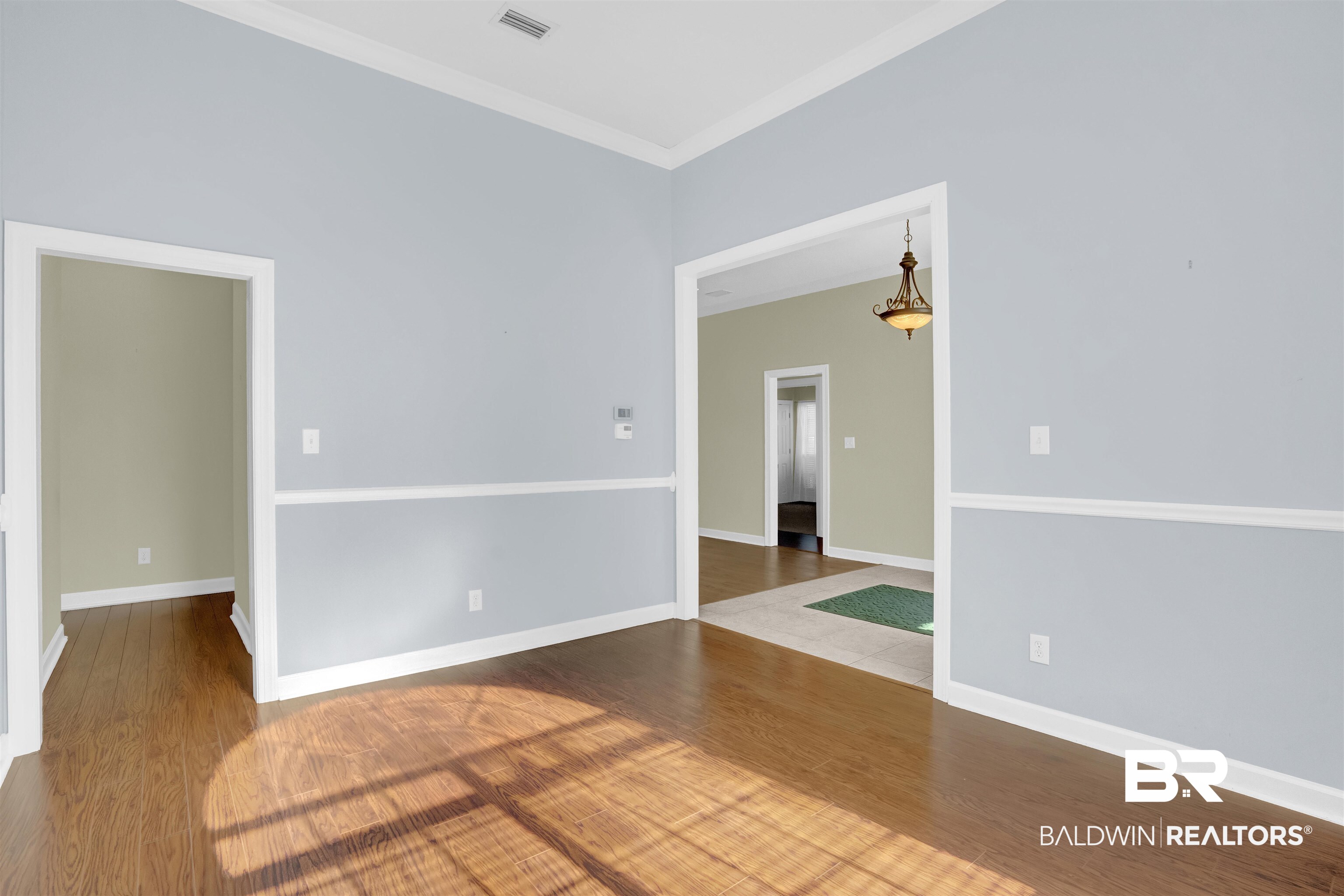 100 Conti Court Fairhope, AL 36532 - Photo 28 of 54 Spare room with hardwood / wood-style floors and ornamental molding