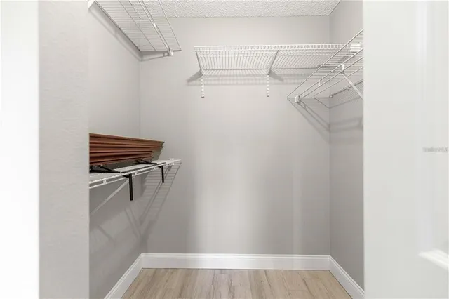 a view of a room with racks on the wall