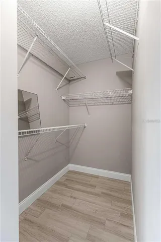 a view of a room with racks on the wall