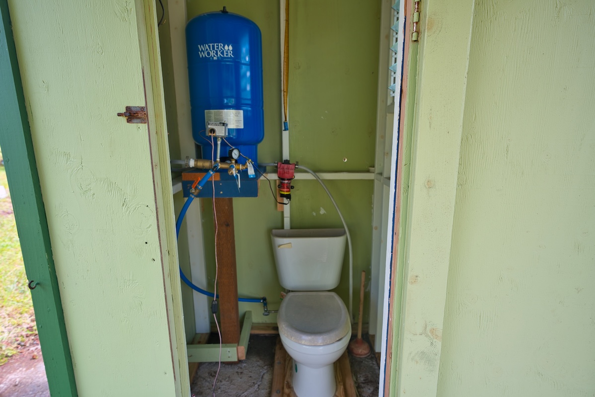 11-1984 Ohialani Road Mountain View, HI 96771 - Photo 16 of 19 a bathroom with a toilet and a sink