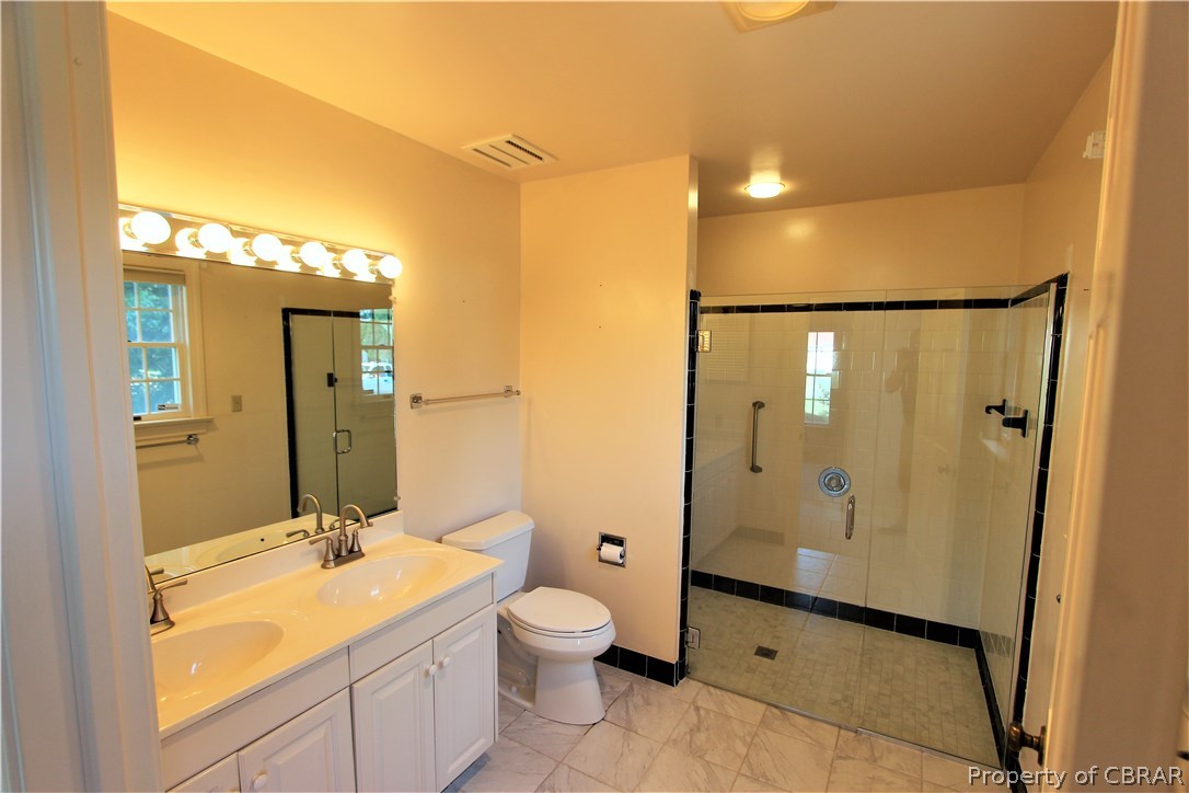 2893 Decatur Drive Hayes, VA 23072 - Photo 15 of 25 Master Bedroom with Double Bowl Vanity and Curbless Shower