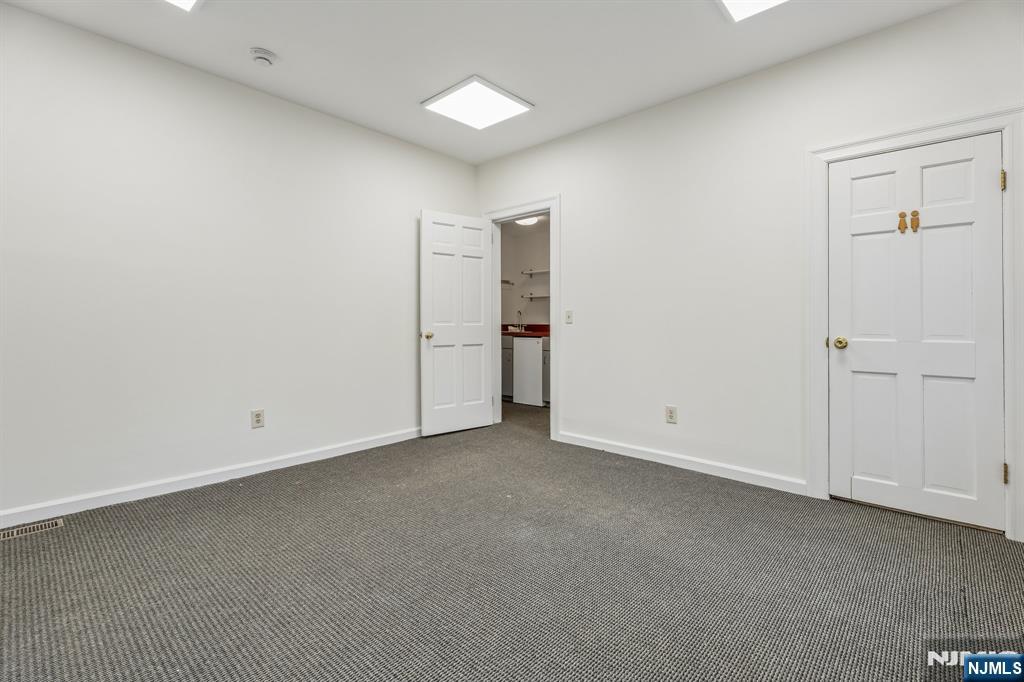 94 Church Street Montclair, NJ 07042 - Photo 12 of 49 an empty room with closet area