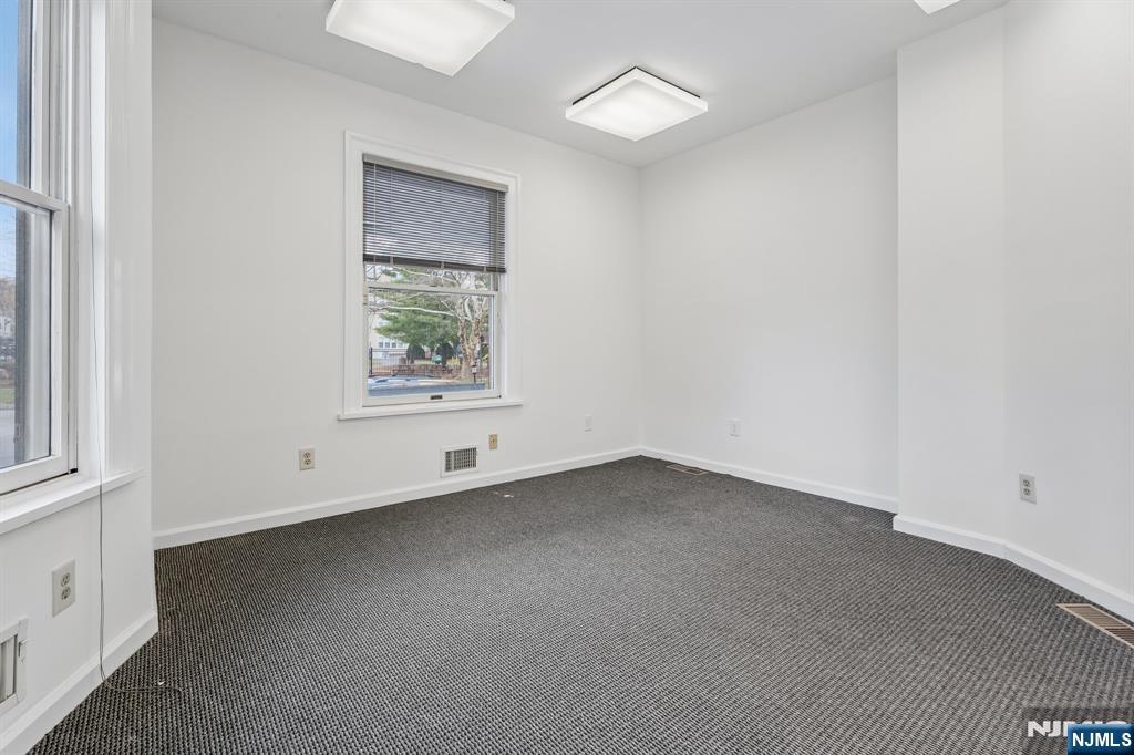 94 Church Street Montclair, NJ 07042 - Photo 13 of 49 an empty room with a window