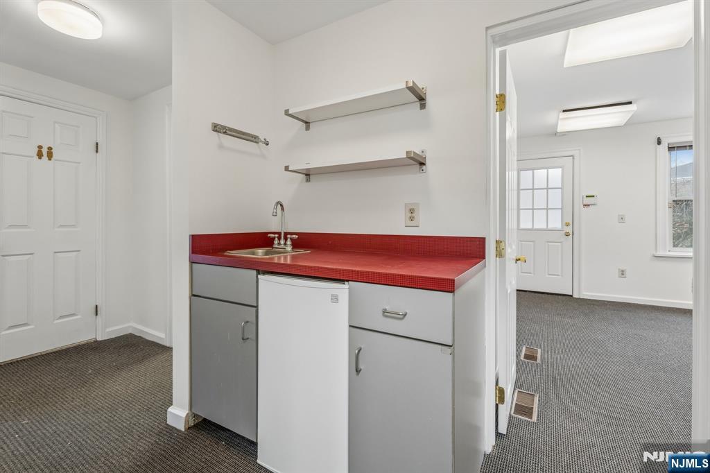 94 Church Street Montclair, NJ 07042 - Photo 16 of 49 a utility room with dryer and washer