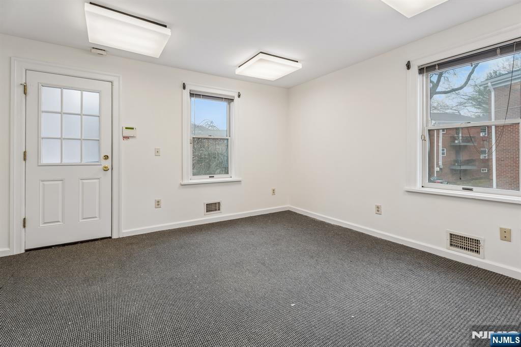 94 Church Street Montclair, NJ 07042 - Photo 17 of 49 an empty room with a window
