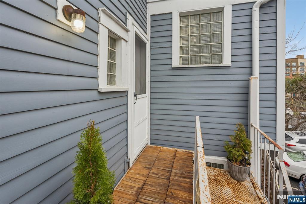 94 Church Street Montclair, NJ 07042 - Photo 3 of 49 a view of a house with a door and wooden floor