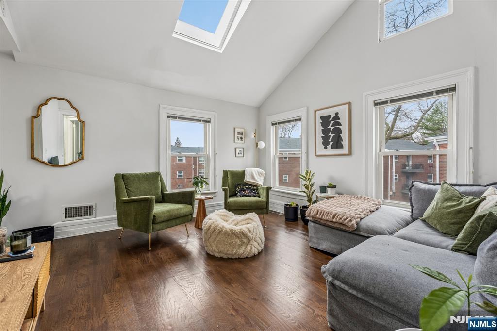 94 Church Street Montclair, NJ 07042 - Photo 40 of 49 a living room with furniture or couch and a wooden floor