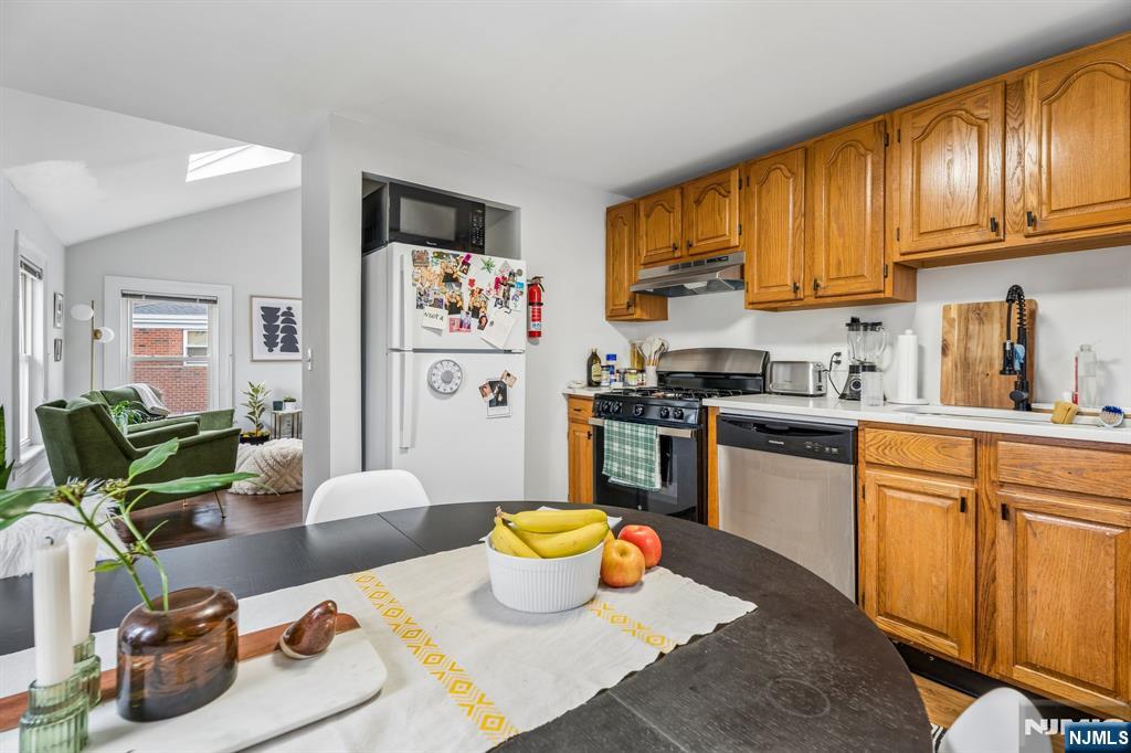 94 Church Street Montclair, NJ 07042 - Photo 44 of 49 a kitchen with a refrigerator and a sink