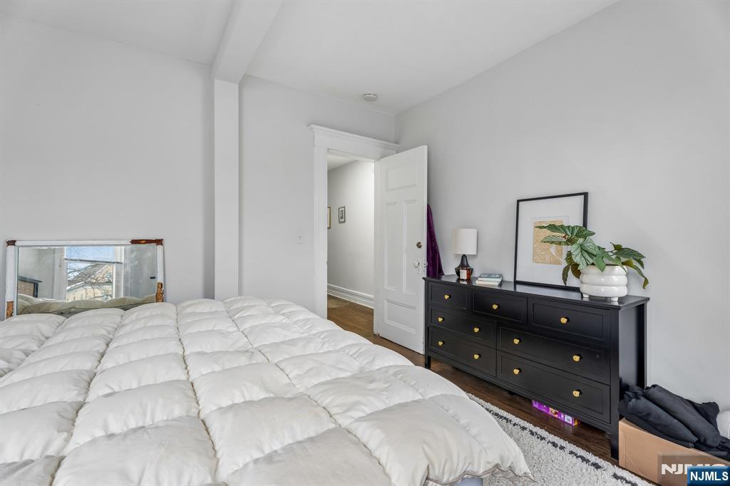 94 Church Street Montclair, NJ 07042 - Photo 47 of 49 a bedroom with a bed and a dresser