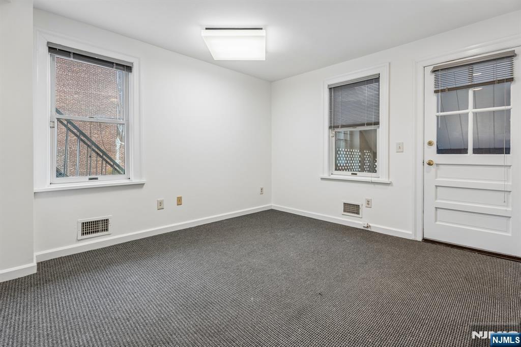 94 Church Street Montclair, NJ 07042 - Photo 9 of 49 an empty room with a window