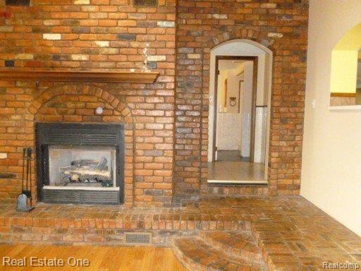 26840 Sumpter Road Belleville, MI 48111 - Photo 23 of 34 Fireplace.JPG