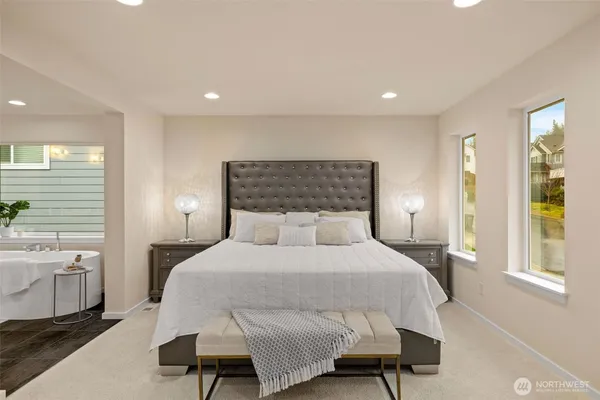 a bedroom with a bed and a lamp with window