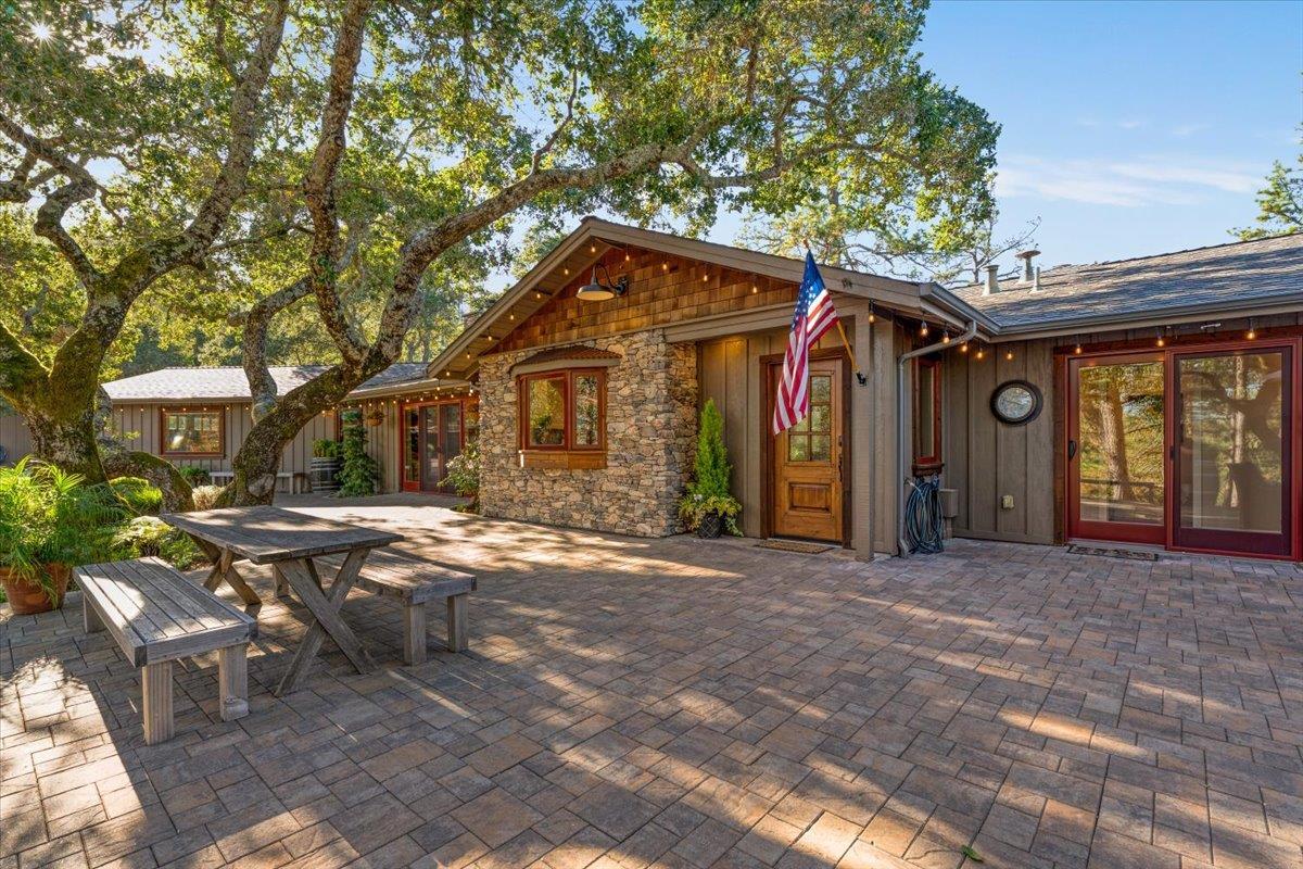 7409 Hihn Road Ben Lomond, CA 95005 - Photo 13 of 101 a front view of a house with a yard