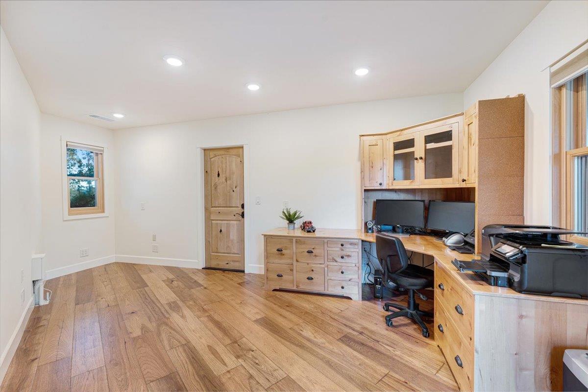 7409 Hihn Road Ben Lomond, CA 95005 - Photo 35 of 101 a view of a workspace with furniture and wooden floor