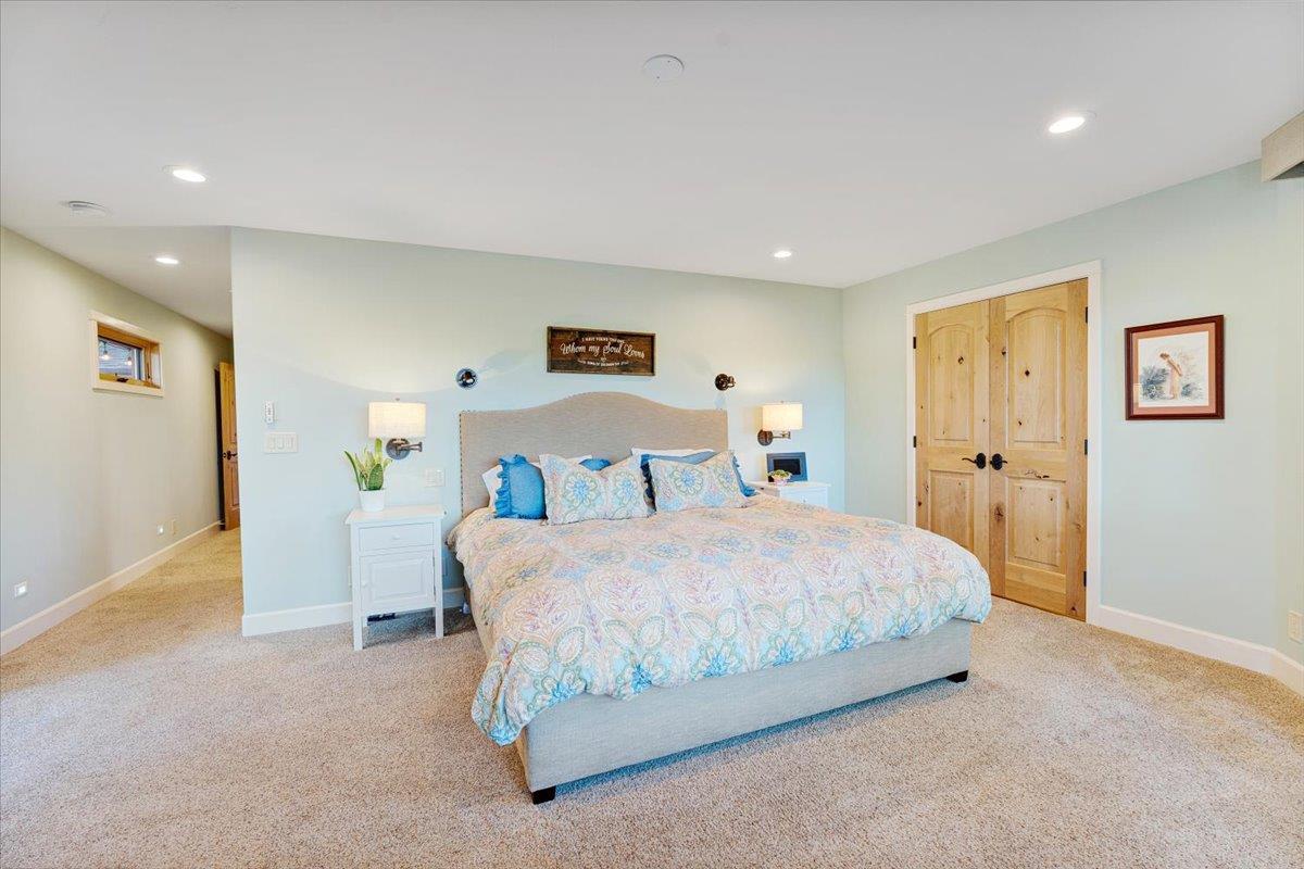7409 Hihn Road Ben Lomond, CA 95005 - Photo 40 of 101 a bedroom with a bed and painting on the wall