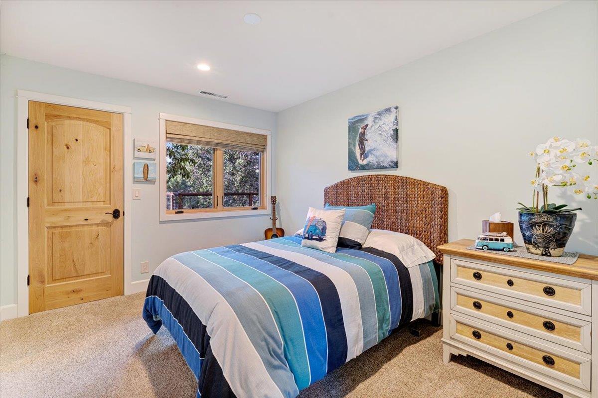 7409 Hihn Road Ben Lomond, CA 95005 - Photo 61 of 101 a bedroom with a bed and a window