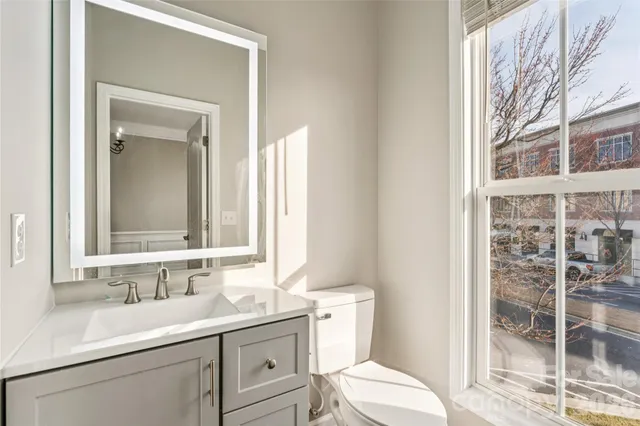 a view of a kitchen from the hallway