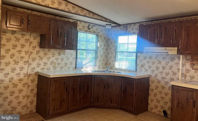 a bathroom with a toilet and a sink