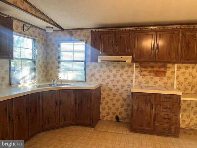 a bathroom with a sink and a shower