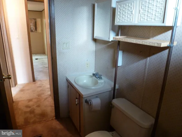 a view of outdoor space with deck and yard