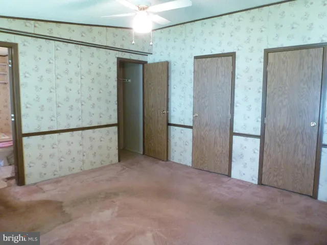 a view of house with backyard outdoor seating and green space