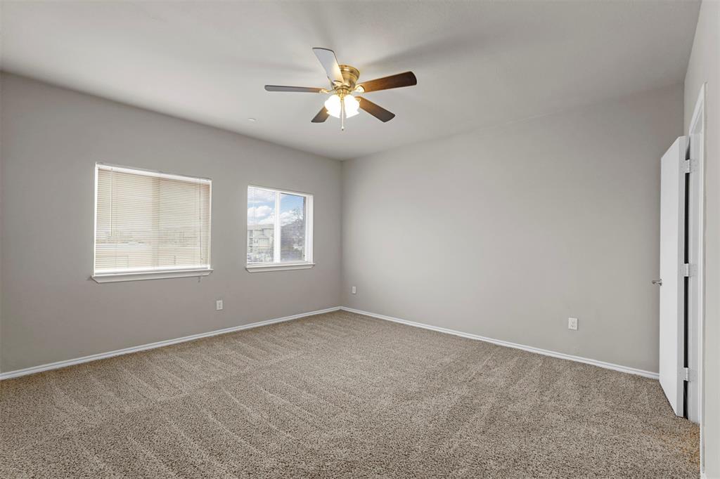 514 East Hazelwood Street, Unit A Princeton, TX 75407 - Photo 13 of 19 a view of an empty room with a window