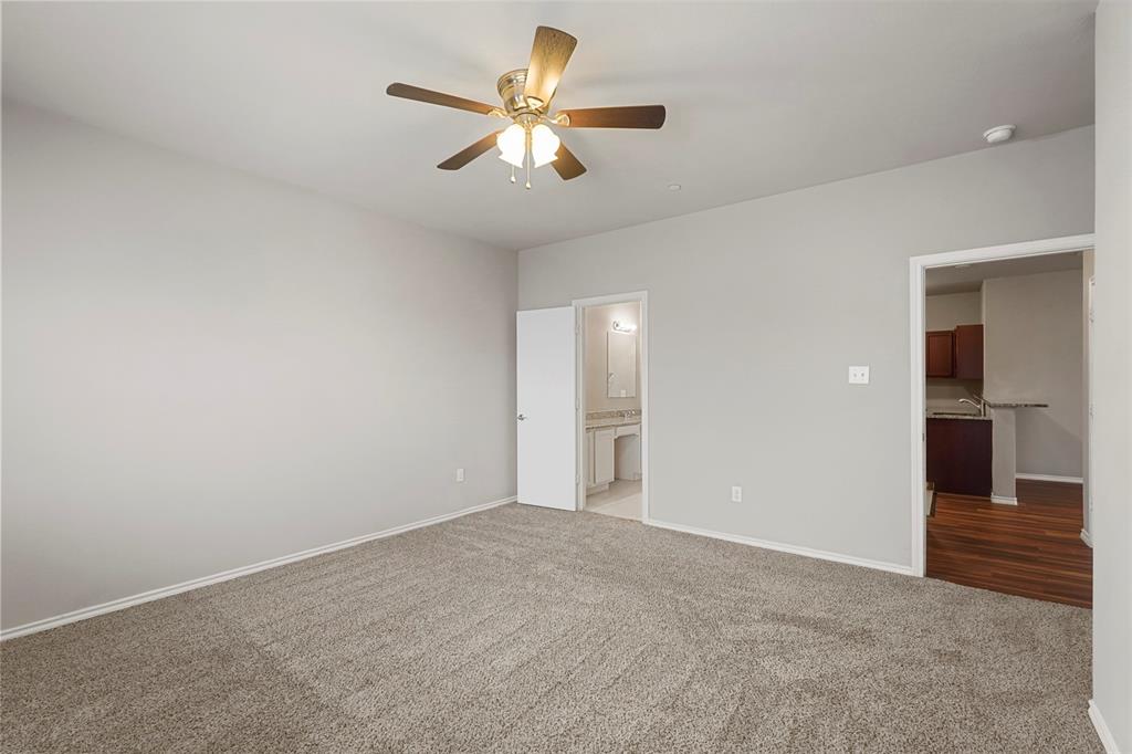 514 East Hazelwood Street, Unit A Princeton, TX 75407 - Photo 14 of 19 an empty room with closet and windows