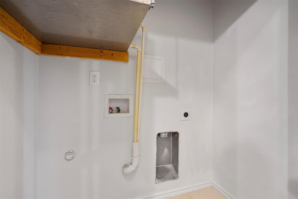 514 East Hazelwood Street, Unit A Princeton, TX 75407 - Photo 18 of 19 a bathroom with a shower