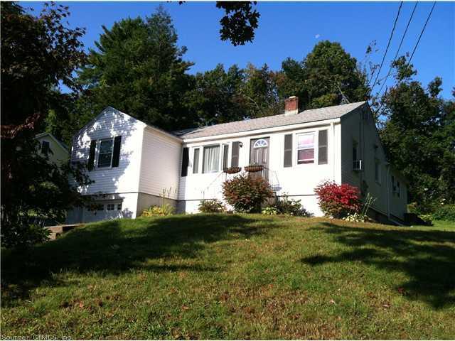 291 South Road Farmington, CT 06032 - Photo 1 of 1 a front view of a house with a yard