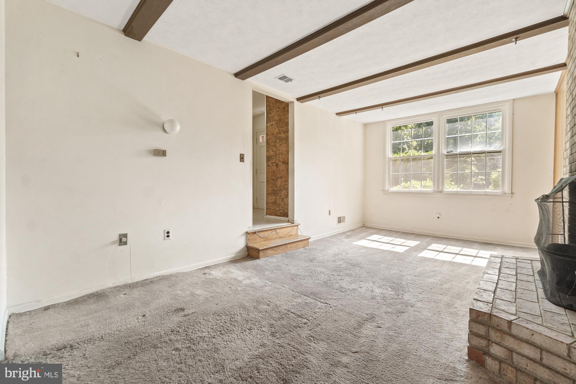 16524 Redland Road Derwood, MD 20855 - Photo 17 of 35 Step down to the family room