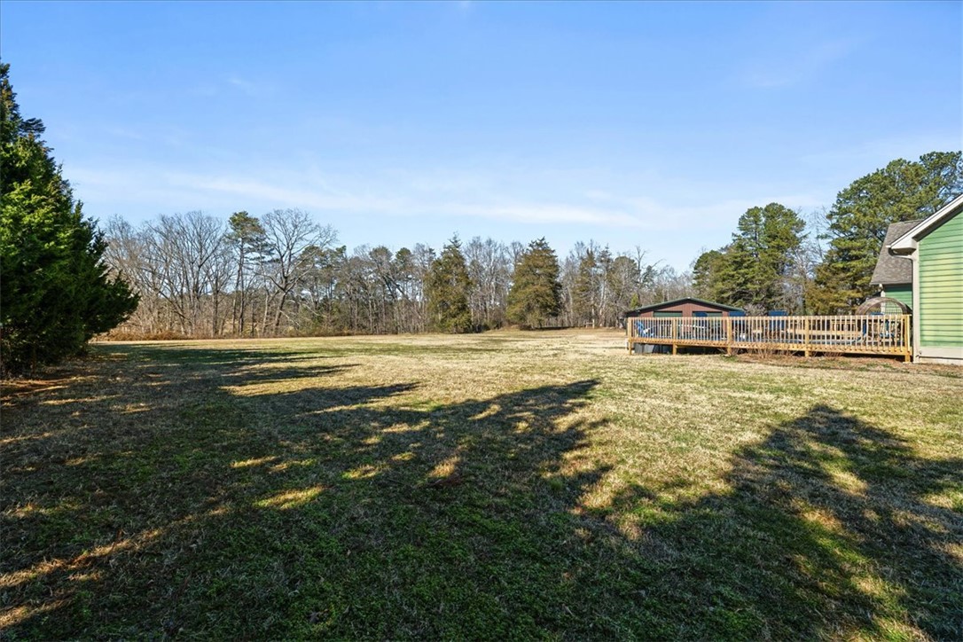 212 Winding Lane Seneca, SC 29672 - Photo 33 of 47 Expansive outdoor area featuring a wooden deck perfect for relaxation and entertainment.