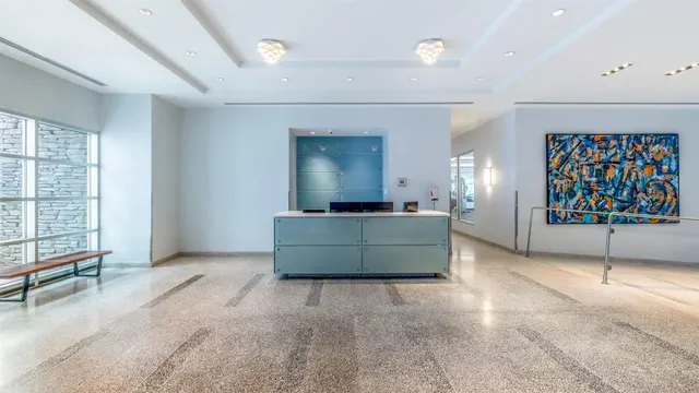 a room with a table and chairs