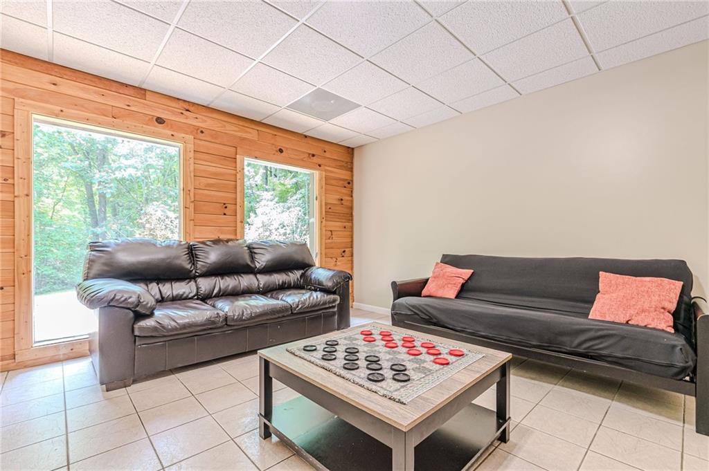 45 Chestatee River Ridge Dahlonega, GA 30533 - Photo 11 of 74 a living room with furniture and a window