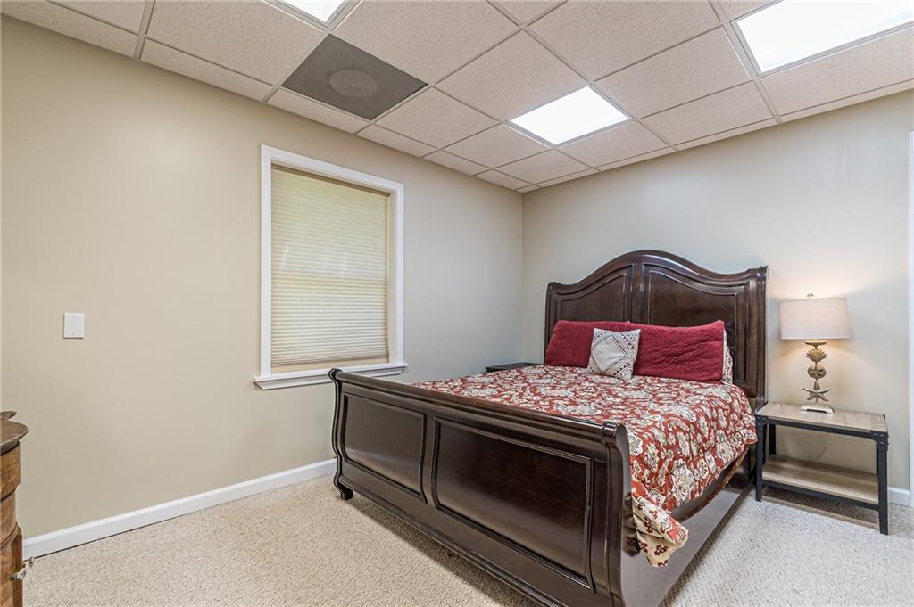 45 Chestatee River Ridge Dahlonega, GA 30533 - Photo 18 of 74 a bedroom with a bed and a window