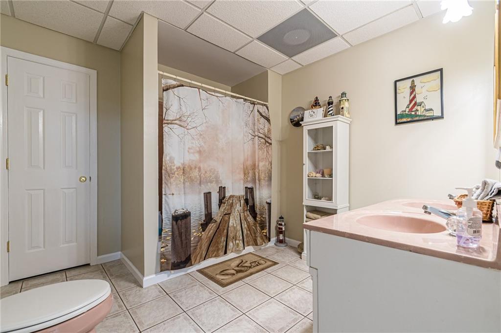 45 Chestatee River Ridge Dahlonega, GA 30533 - Photo 20 of 74 a bathroom with a sink a toilet and a shower