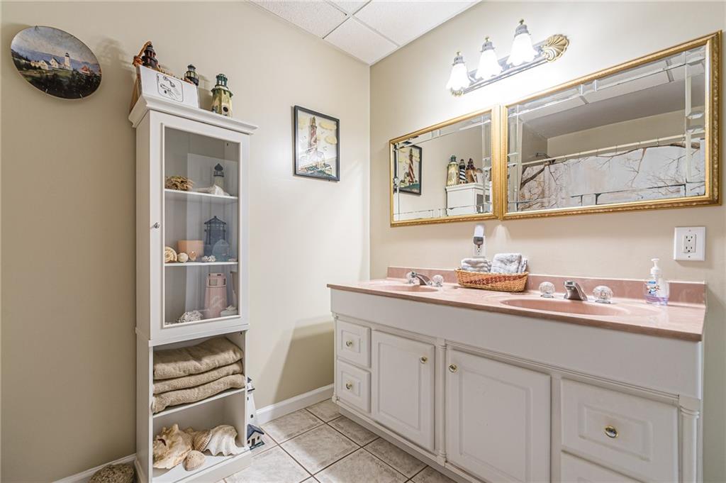 45 Chestatee River Ridge Dahlonega, GA 30533 - Photo 21 of 74 a bathroom with a sink a vanity and a mirror